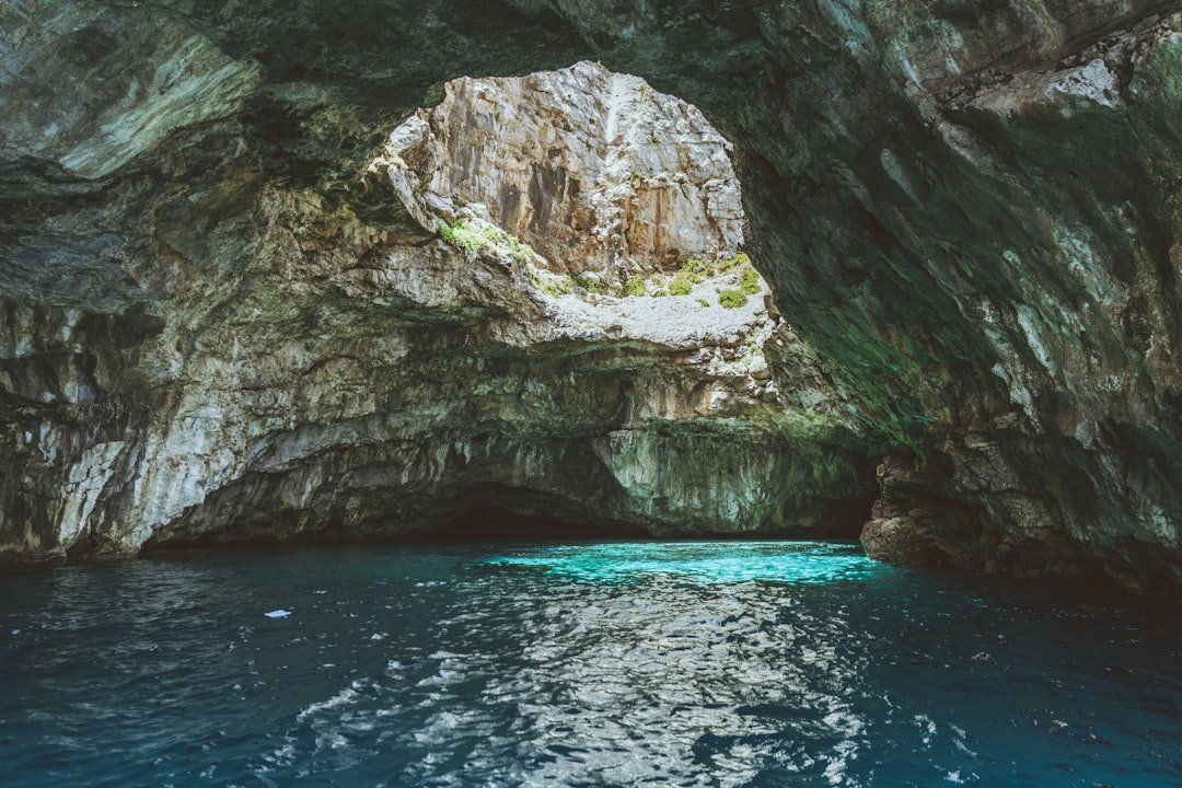 Benagil sea cave with sandy beach and light