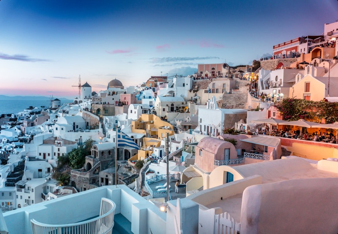Oia Santorini caldera cliffside buildings