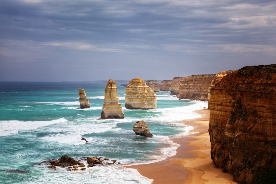 Twelve Apostles limestone stacks along coastal cliffs