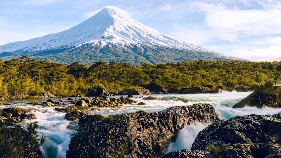Lakeside town with volcano backdrop