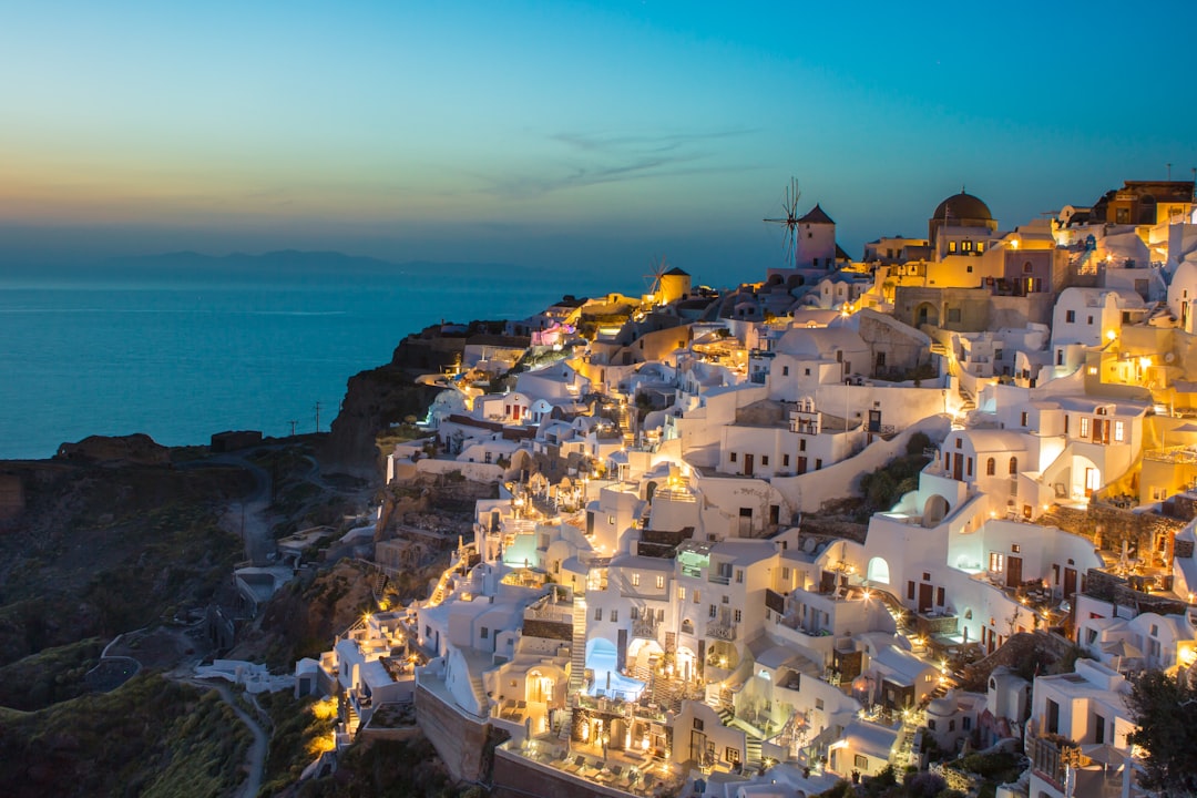 Oia Santorini white houses on caldera cliffs