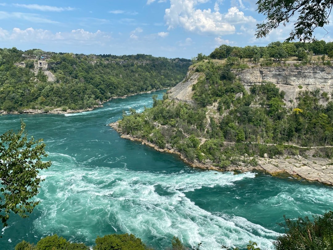 Whirlpool Aero Car suspended over rapids