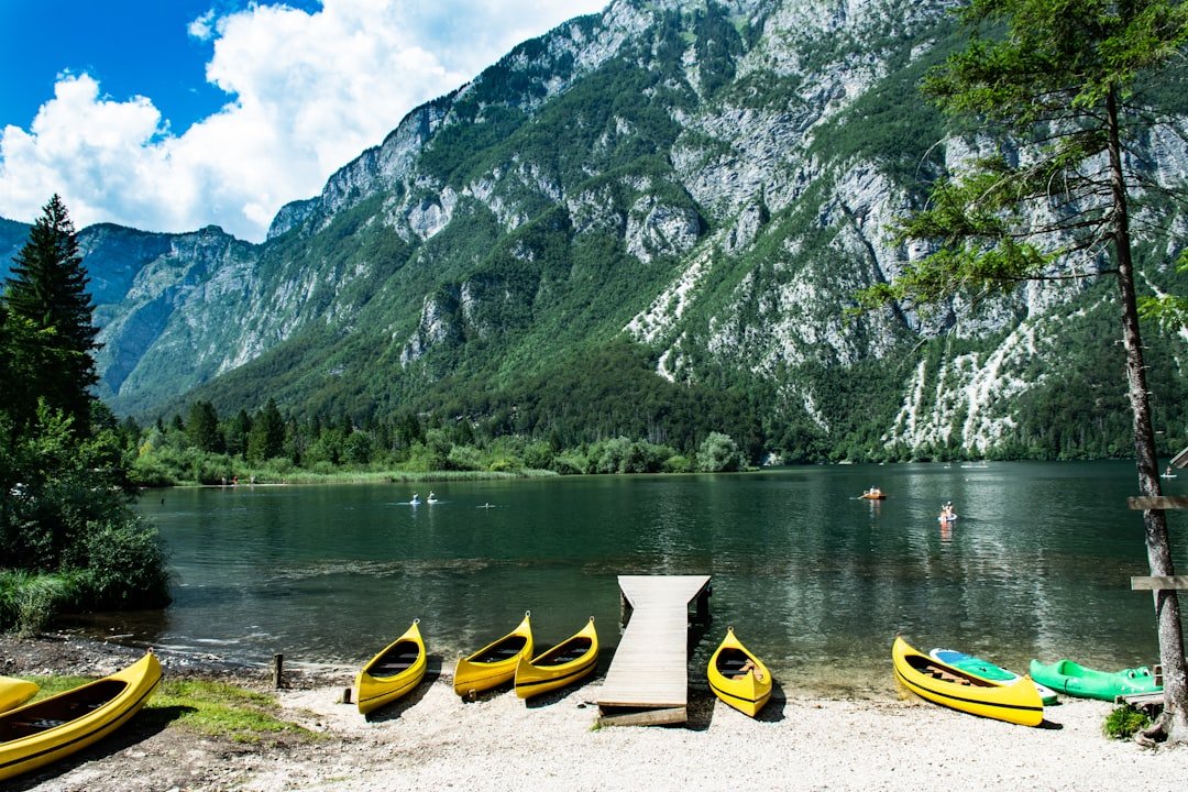 Lake Bohinj clear water surrounded by peaks