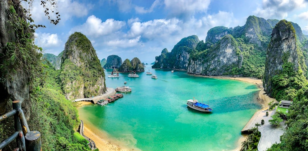 Ha Long Bay limestone karsts and emerald water