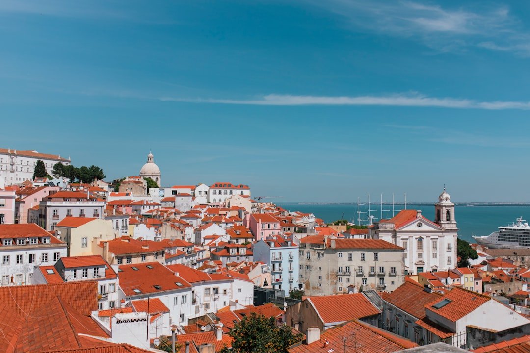 Miradouro overlooking Lisbon red roofs and Tagus