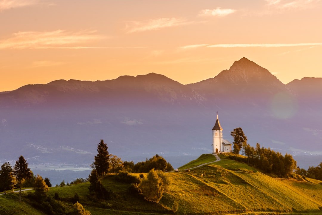Jamnik church with Julian Alps