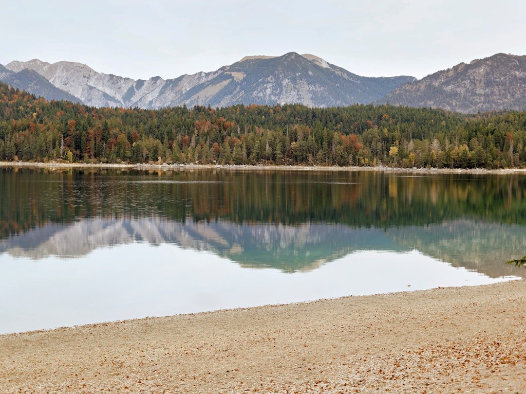 Turquoise lake with islands and mountain backdrop