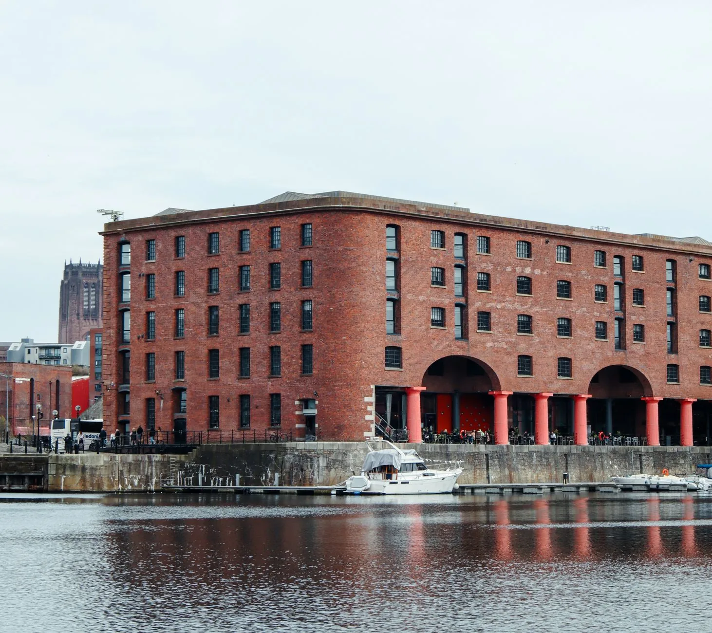 Scenic view of Royal Albert Dock in Liverpool with boats on the water.