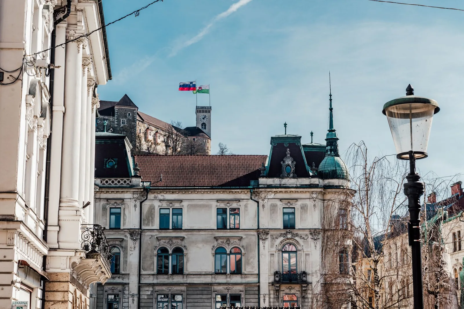 Charming view of Ljubljana's historic architecture with Ljubljana Castle in Slovenia.