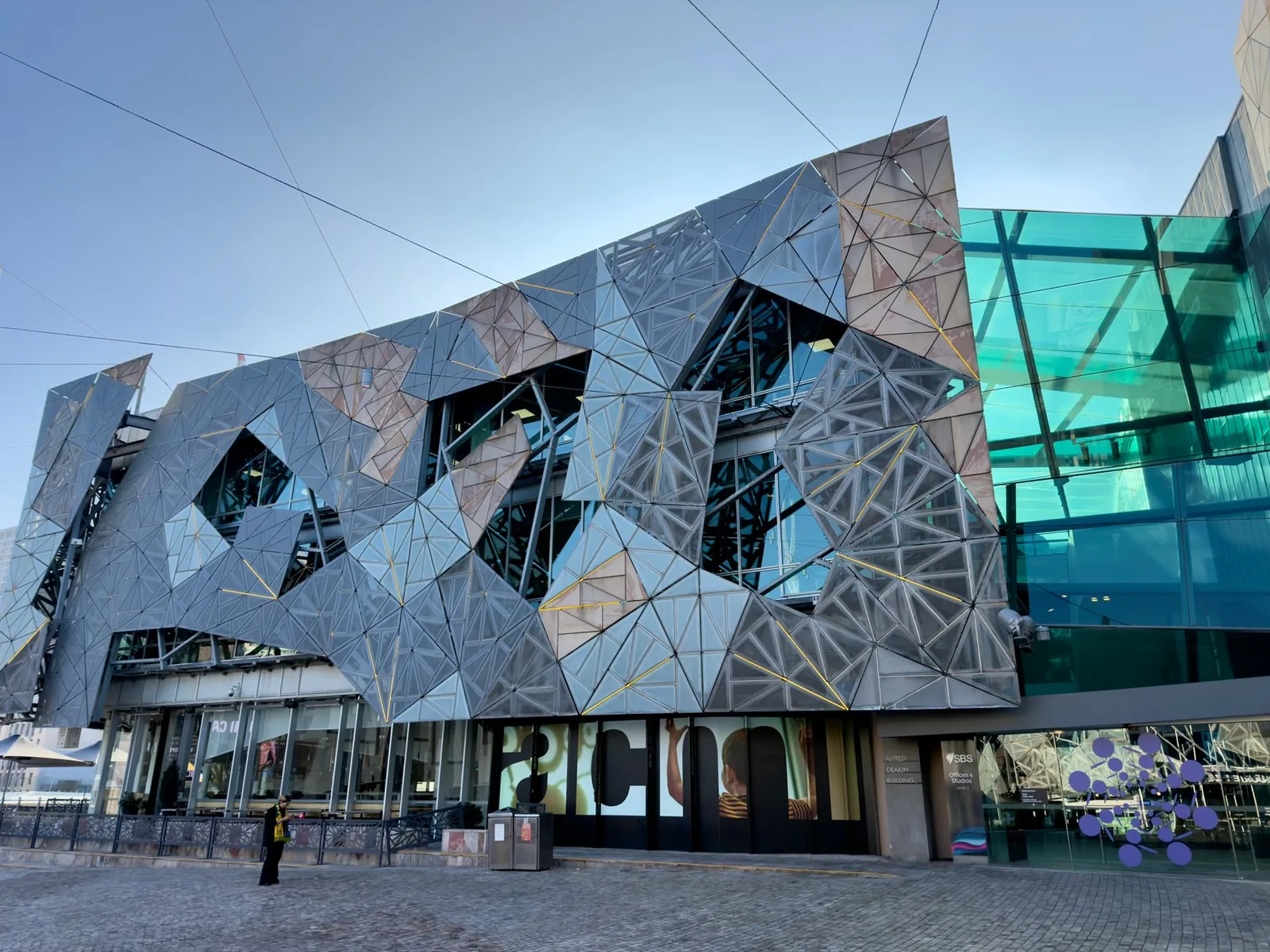 Modern architectural design at Federation Square, Melbourne, showcasing geometric patterns.