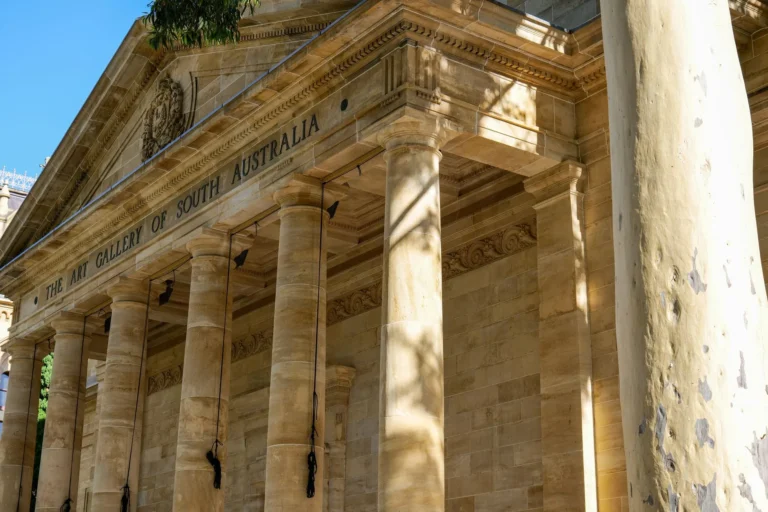 The historic facade of the Art Gallery of South Australia in Adelaide captured on a sunny day.