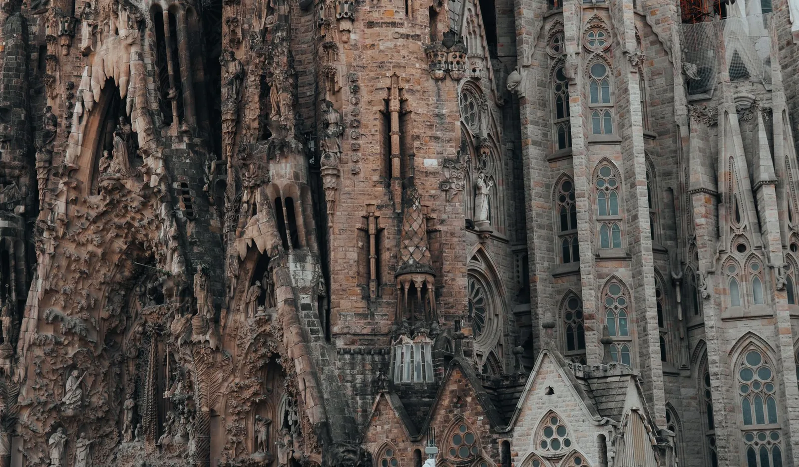 Close-up view of the detailed gothic architecture of Sagrada Familia in Barcelona, Spain.