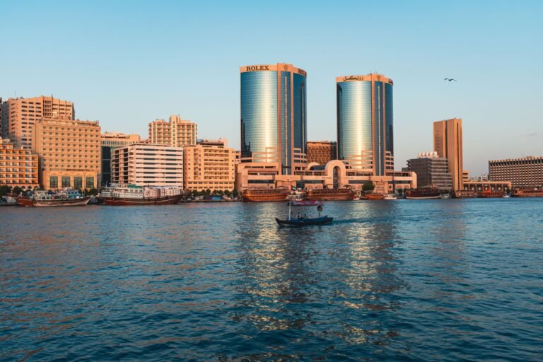 Deira Twin Towers and surrounding buildings at sunset in Dubai