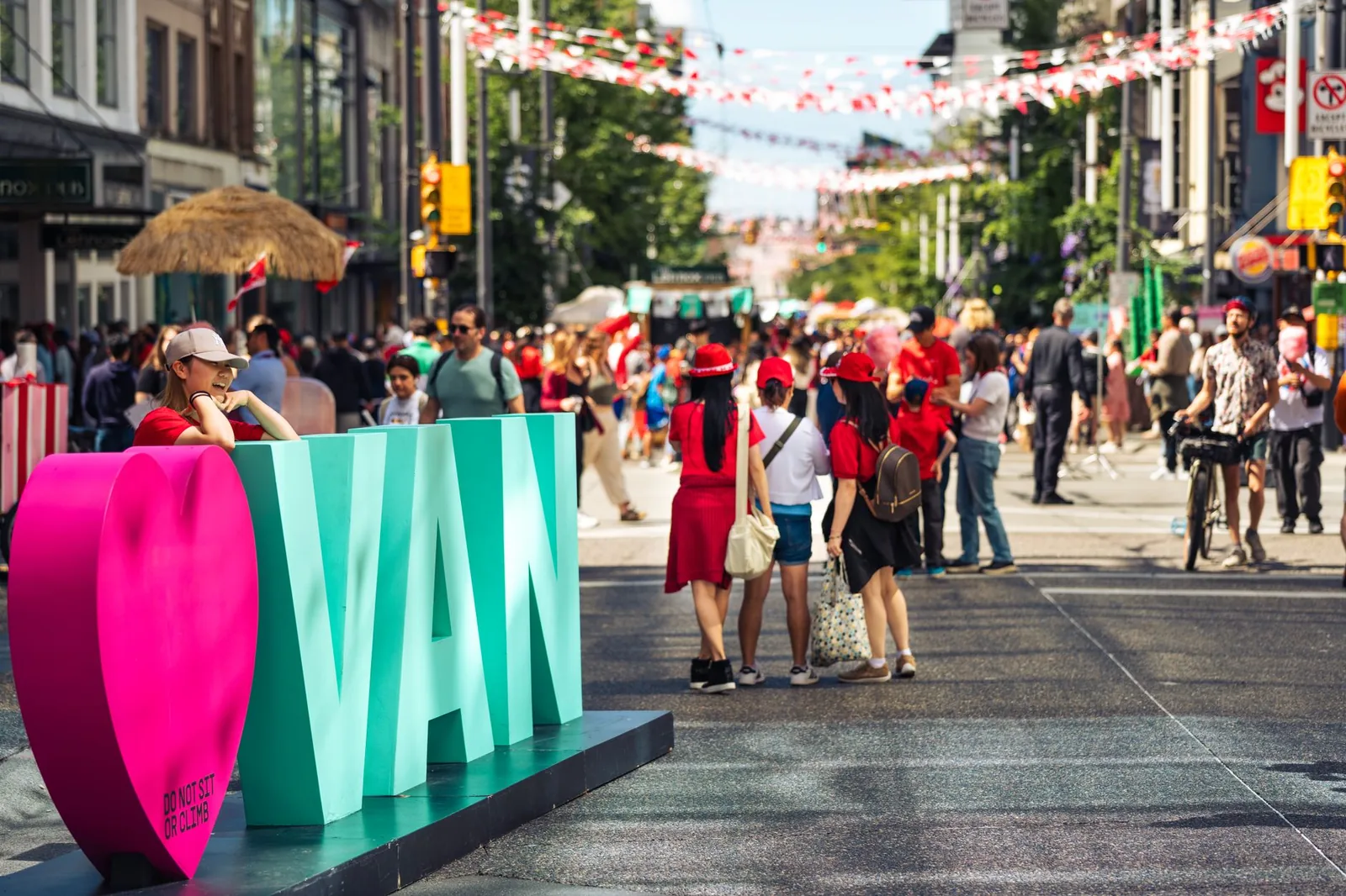 Lively Canada Day celebration on a sunny day in Vancouver, British Columbia.